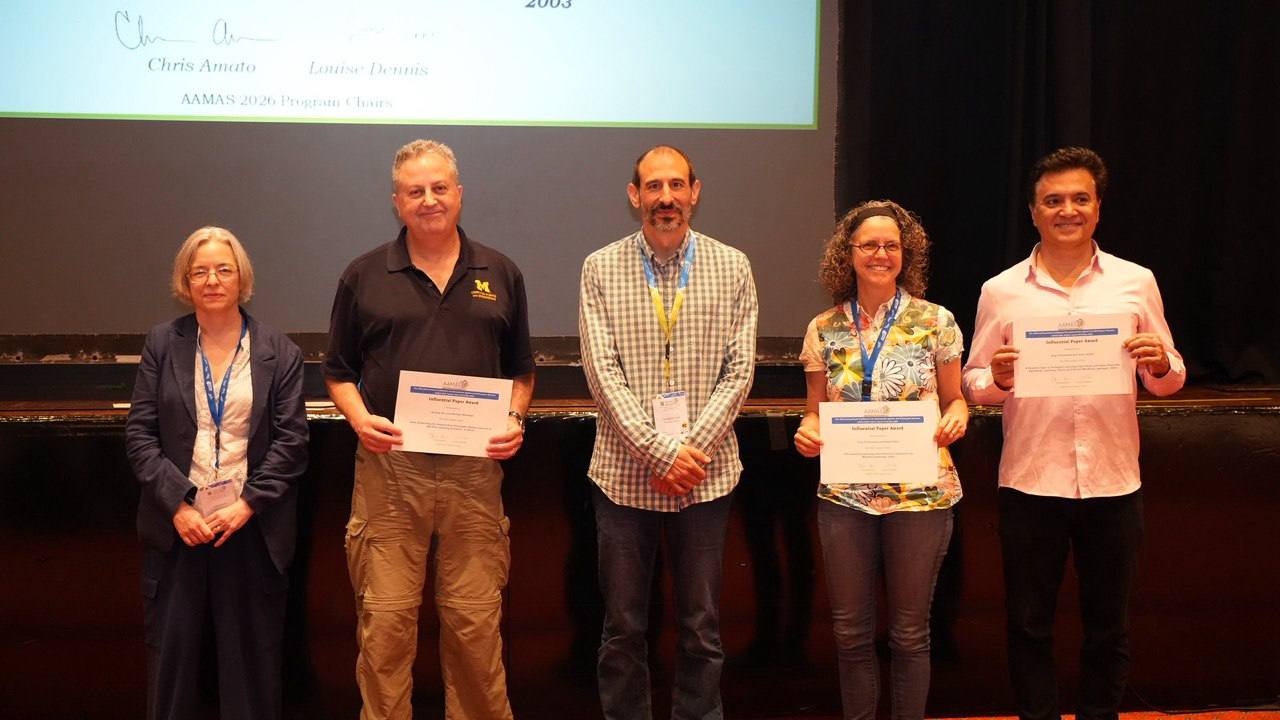 Influential Paper Award recipients on stage at AAMAS 2026